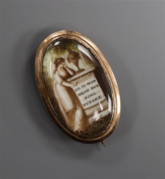A 19th century yellow metal and ivory oval mourning brooch, 29mm.